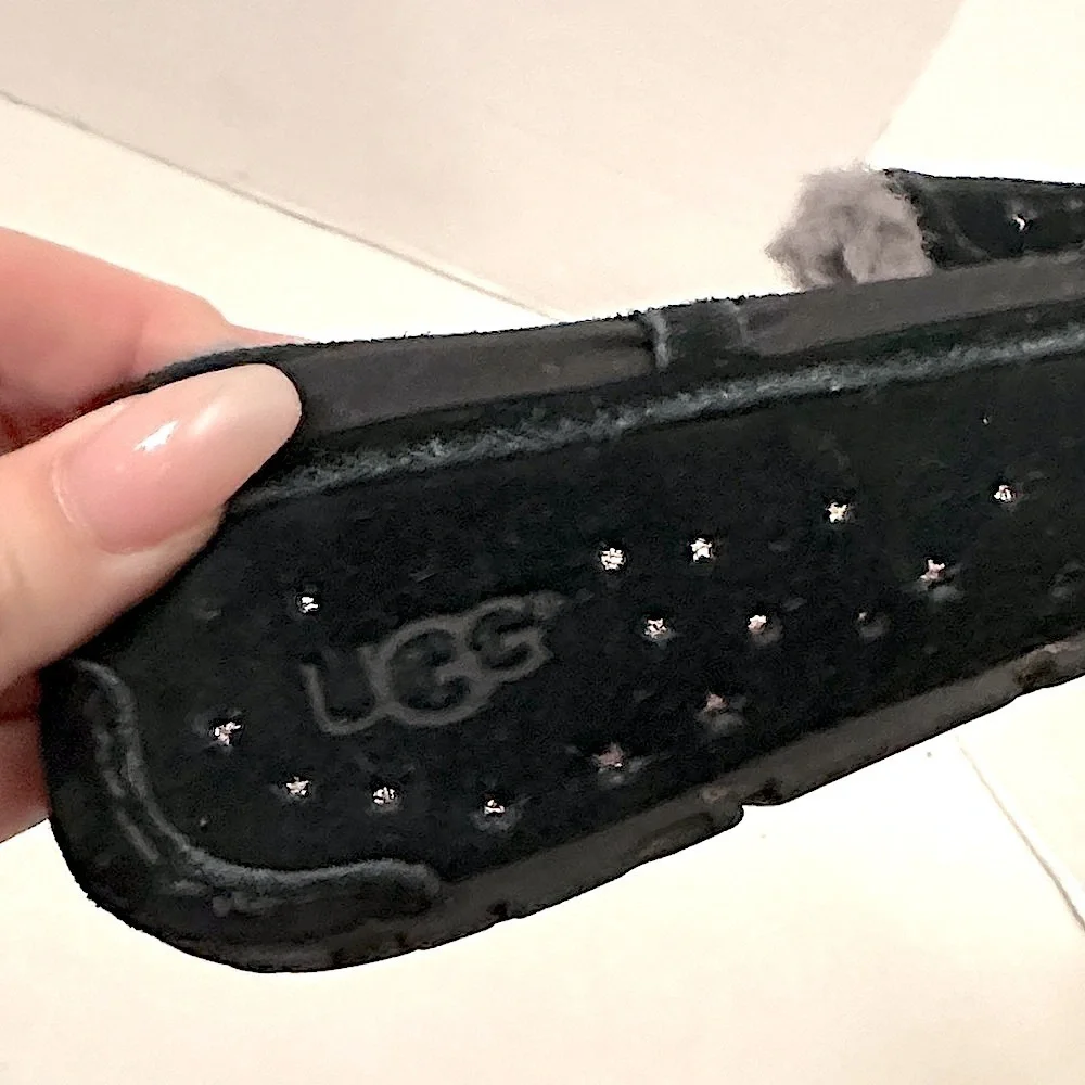 UGG Black Starry Moccasins with gray Shearling size 5 girls or 7 women’s